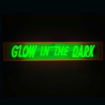 <b>Glow in the Dark by Anne Ashley</b>, 2009<br>Fluorescent cast acrylic, luminous tube, electrical components, blacklight, 34x6x4 inches<br>$1700