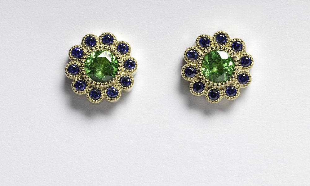 One pair 14kt yellow gold earrings, green tsavorite garnet, blue sapphires