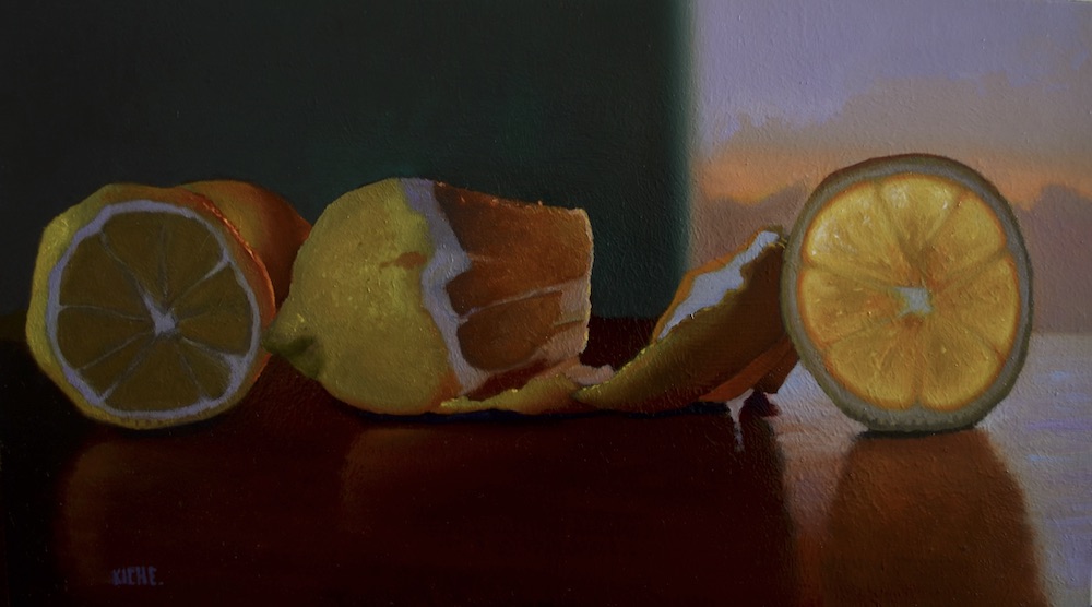 Summer lemons by evening window